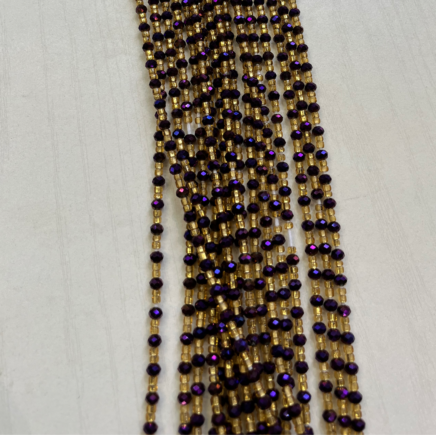 Gold and purple Waistbeads