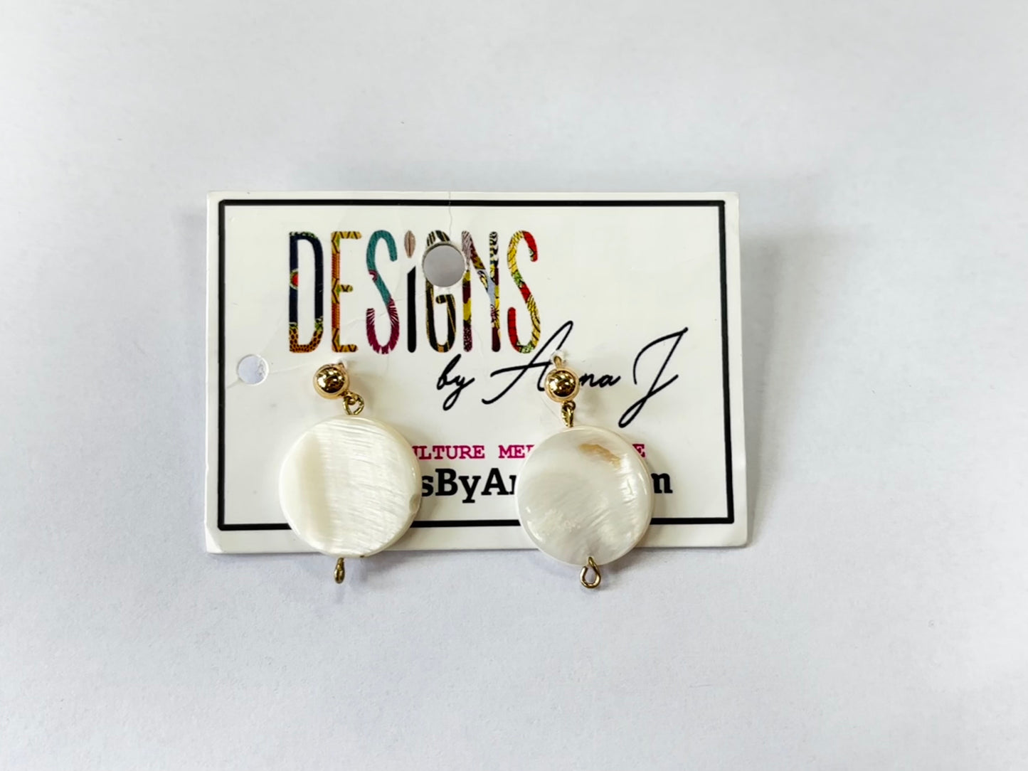 White Circle With Gold Earrings